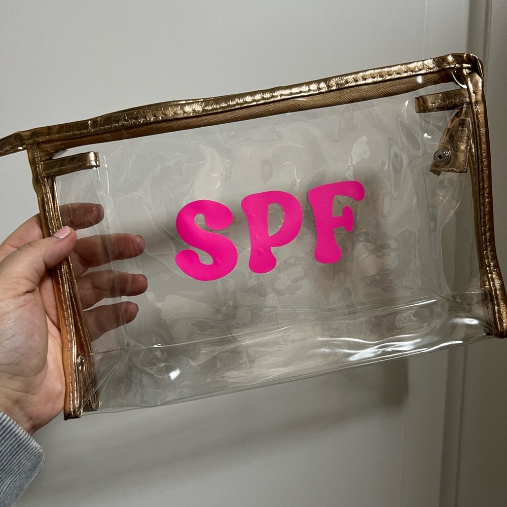 Clear Cosmetic Bag with Pink SPF Letters